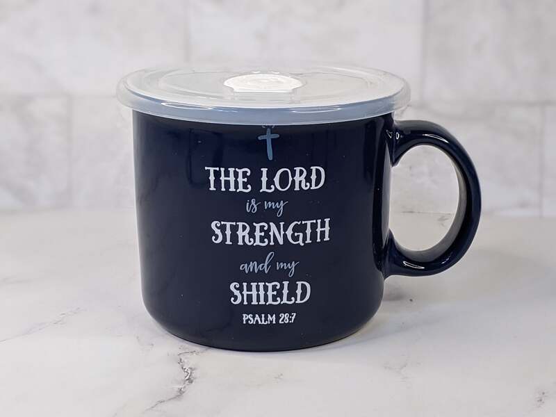 A dark blue ceramic soup mug, featuring a Bible verse, with plastic vented lid.